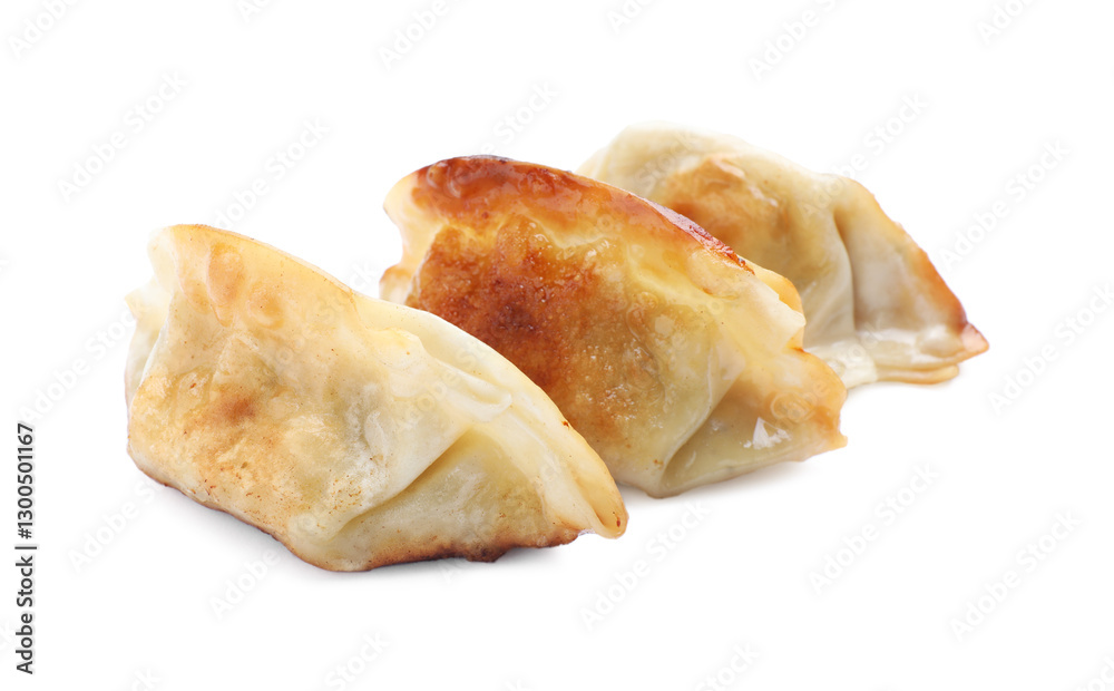 Delicious fried gyoza dumplings isolated on white Delicious fried gyoza dumplings isolated on white