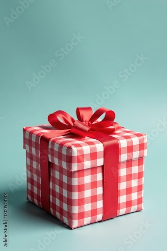 Gift box wrapped in red and white gingham fabric with a bow, present, gingham, gift