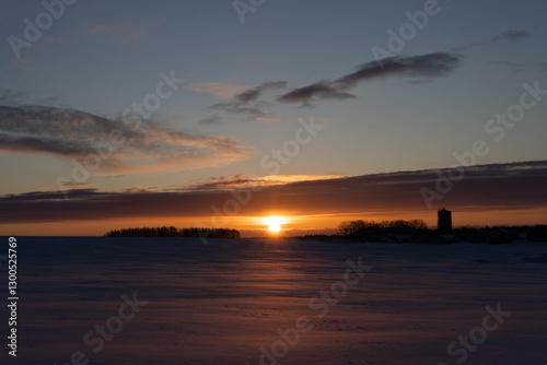 Sunrise over snow field in Hokkaido japan