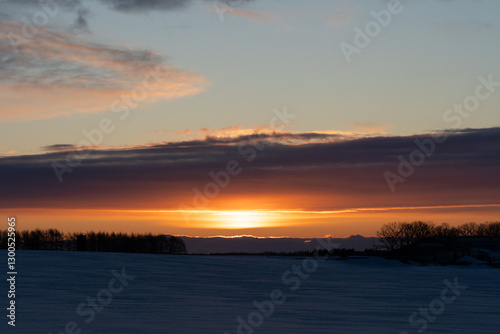 Sunrise over snow field in Hokkaido japan