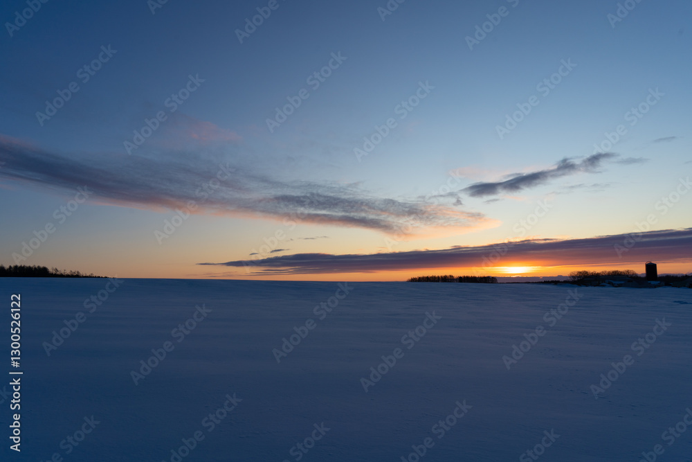 Sunrise over snow field in Hokkaido japan Sunrise over snow field in Hokkaido japan