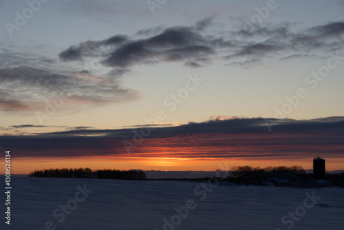 Sunrise over snow field in Hokkaido japan