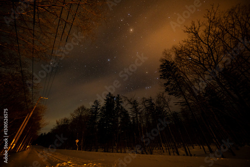 winter road in the night with stars 