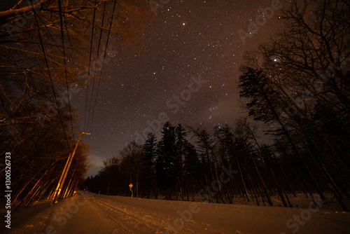 winter road in the night with stars 