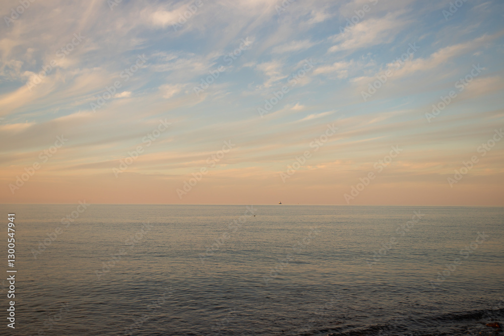 Naklejka premium Sunset at sea, twilight sky and tranquil water, background for a tropical wallpaper.