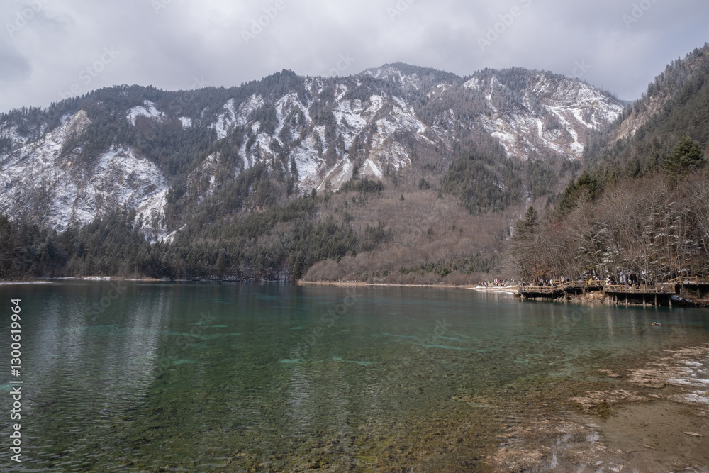 Obraz premium Jiuzhai Valley National Park located in Sichuan Province, China, is a UNESCO world natural and cultural site. As the world's most beautiful national park, it features unique waterfalls, colorful lakes