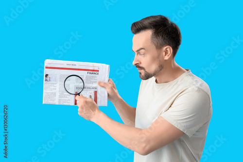 Handsome man with magnifier...