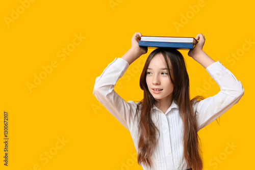 Cute schoolgirl with books ...