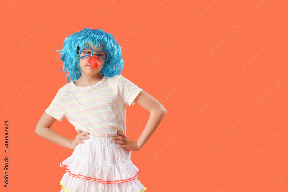 Funny girl with colorful wig and clown nose on orange background. April Fool's Day celebration Funny girl with colorful wig and clown nose on orange background. April Fool's Day celebration