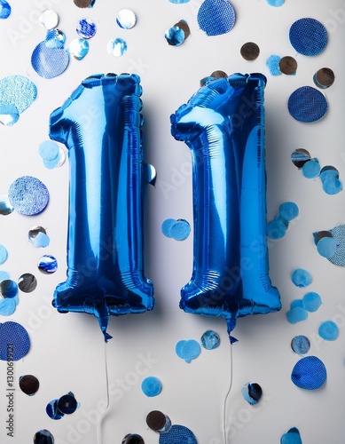 Blue balloon number 11 for eleventh birthday or anniversary party. White background with confetti