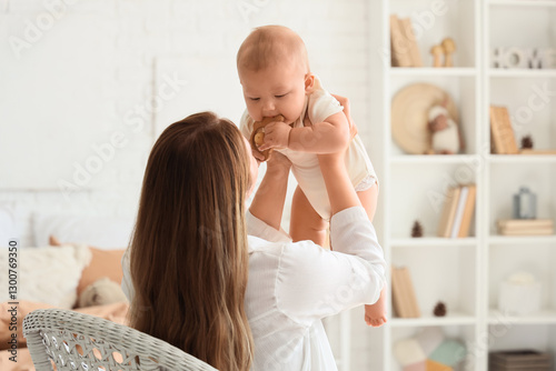 Mother and her baby with ra...