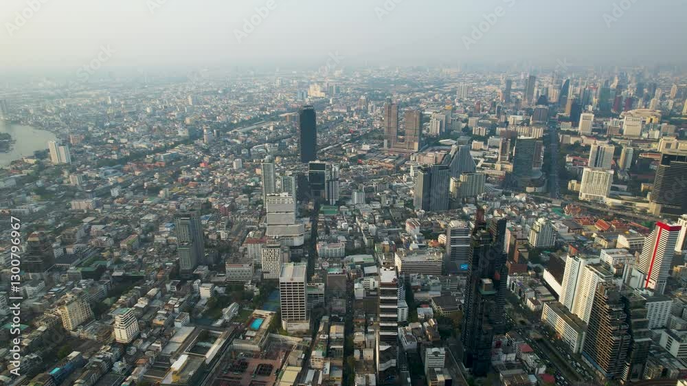 4K Bangkok Downtown in Thailand Asia. Financial district drone view and business area. Smart urban city. Skyscraper and buildings at sunset junction with cars traffic 4K Bangkok Downtown in Thailand Asia. Financial district drone view and business area. Smart urban city. Skyscraper and buildings at sunset junction with cars traffic