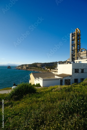 The sea and mountains are landscaped with clouds and sunny weather. Mirador de Playa Cemento