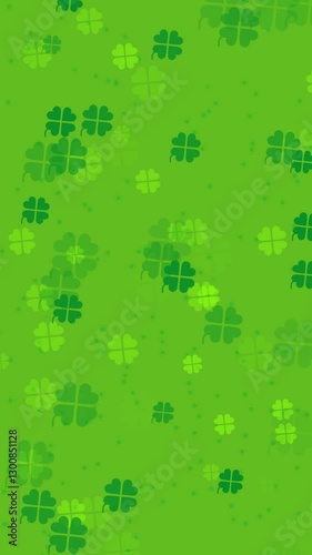 Abstract festive vertical video background with animated four leaf clover leaves or lucky shamrocks falling on bright green backdrop. Decorative celtic animation for St Patrick's Day celebration.