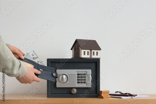 Man with wallet of money an...