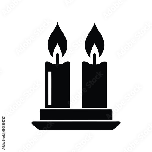 burning candle on a black background