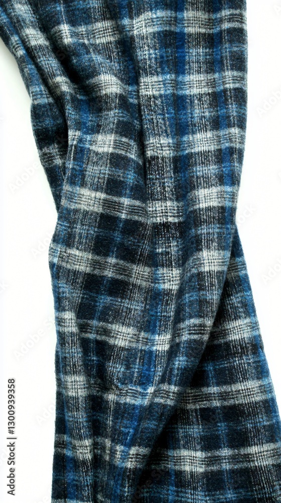 Cozy Textile: A close-up studio shot showcases a section of soft textile fabric with a classic checked pattern in shades of blue and gray, presenting textures Cozy Textile: A close-up studio shot showcases a section of soft textile fabric with a classic checked pattern in shades of blue and gray, presenting textures