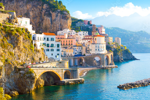 Morning view of Amalfi cityscape on coast line of mediterranean sea, Italy

