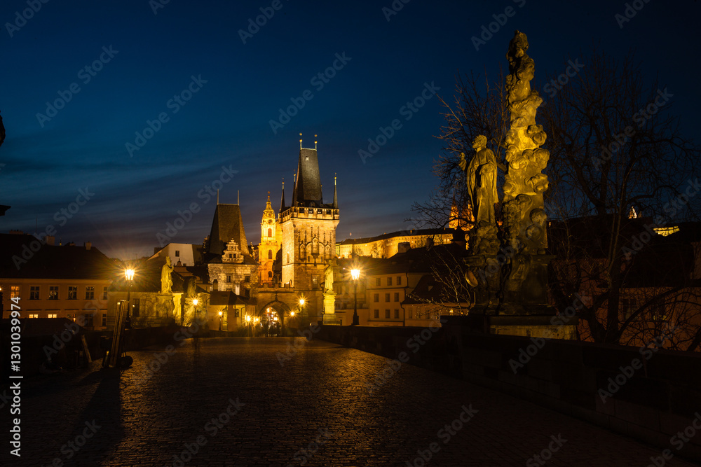 Fototapeta premium Night view of Charles Bridge in capital of Czech Republic Prague. The world famous Prague landmark with beautiful lightening. Long exposure night photo 