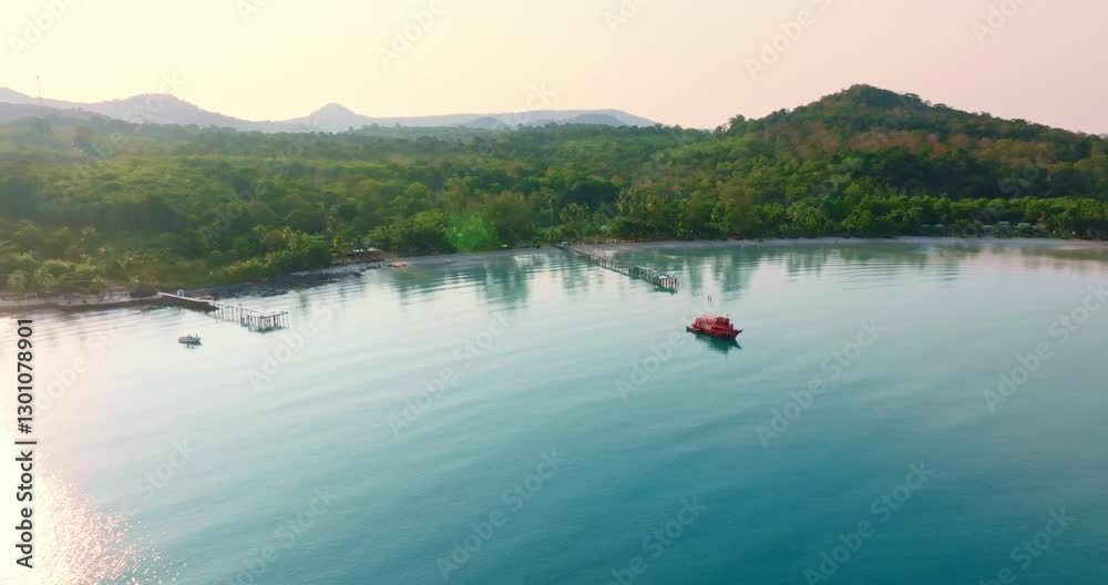 Aerial drone view of the tropical beach with clear turquoise sea, white sand and palm tree. Aerial drone view of the tropical beach with clear turquoise sea, white sand and palm tree.