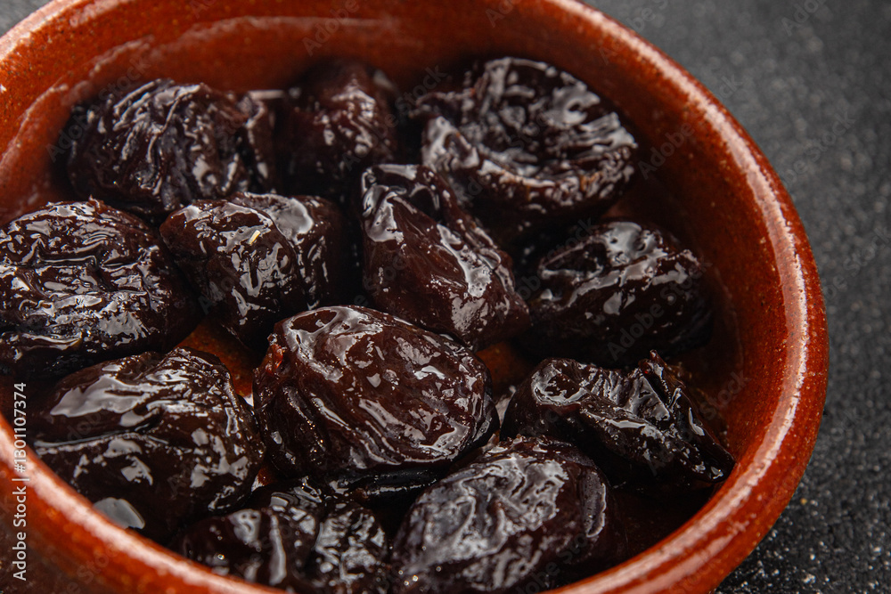 Dried prunes drained smoked plum delicious gourmet food background on the table rustic food top view copy space keto and paleo diet vegetarian and vegan food Dried prunes drained smoked plum delicious gourmet food background on the table rustic food top view copy space keto and paleo diet vegetarian and vegan food