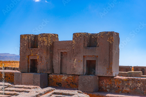 Aerial View of Puma Punku Archaeological Site in Tiwanaku Bolivia Showcasing Pre-Columbian Megalithic Structures and Precise Stone Carvings photo