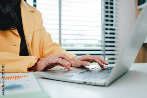 Typing on keyboard Working online on laptop computer On a white table at the office. Facebook chat. Web meeting. Blogger. Journalist writing an article. online job ideas