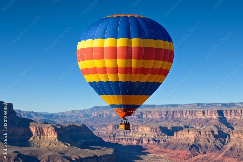 Fototapeta premium A hot air balloon floating over a canyon at sunrise, offering a breathtaking view