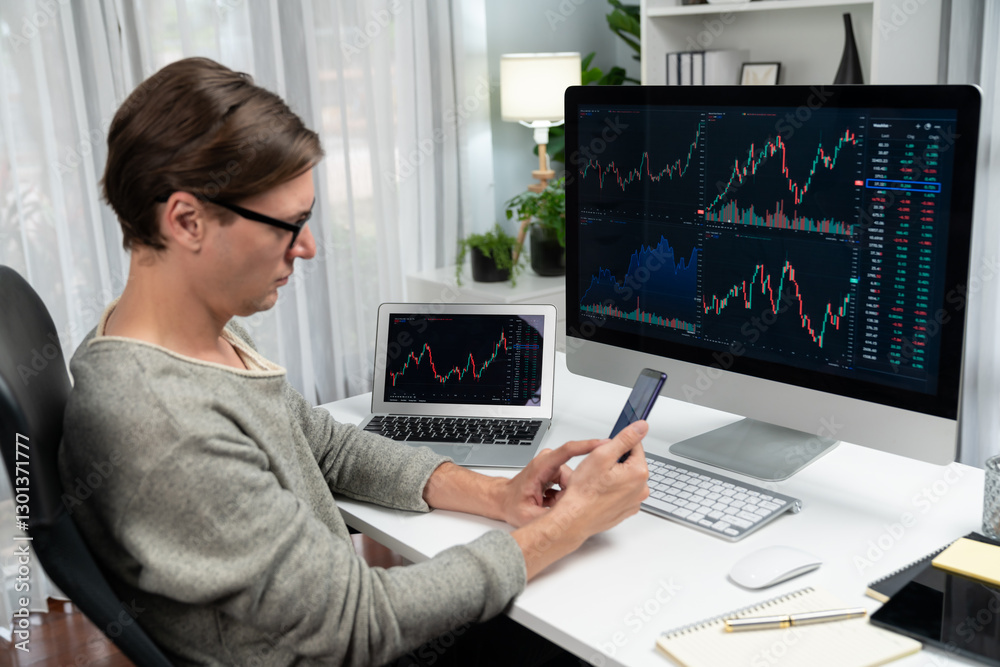 Smart stock investors pointing on screen with smartphone for market stock exchange along with laptop screen in highest dynamic investment rate, focusing data planning at modern workplace. Pecuniary. Smart stock investors pointing on screen with smartphone for market stock exchange along with laptop screen in highest dynamic investment rate, focusing data planning at modern workplace. Pecuniary.