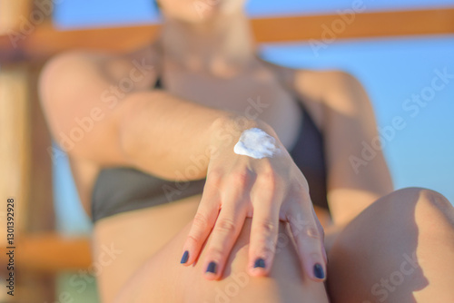 Health skin care, sunscreen, hand cream, putting on sunscreen cream
