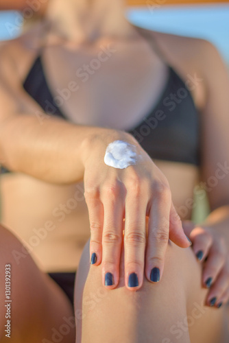 Health skin care, sunscreen, hand cream, putting on sunscreen cream