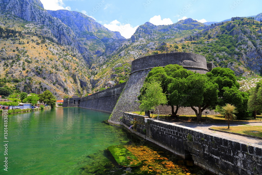 Old medieval fortifications of Kotor, Montenegro - city walls, towers, bastions, forts, castle. Military architecture in Kotor, Montenegro Old medieval fortifications of Kotor, Montenegro - city walls, towers, bastions, forts, castle. Military architecture in Kotor, Montenegro