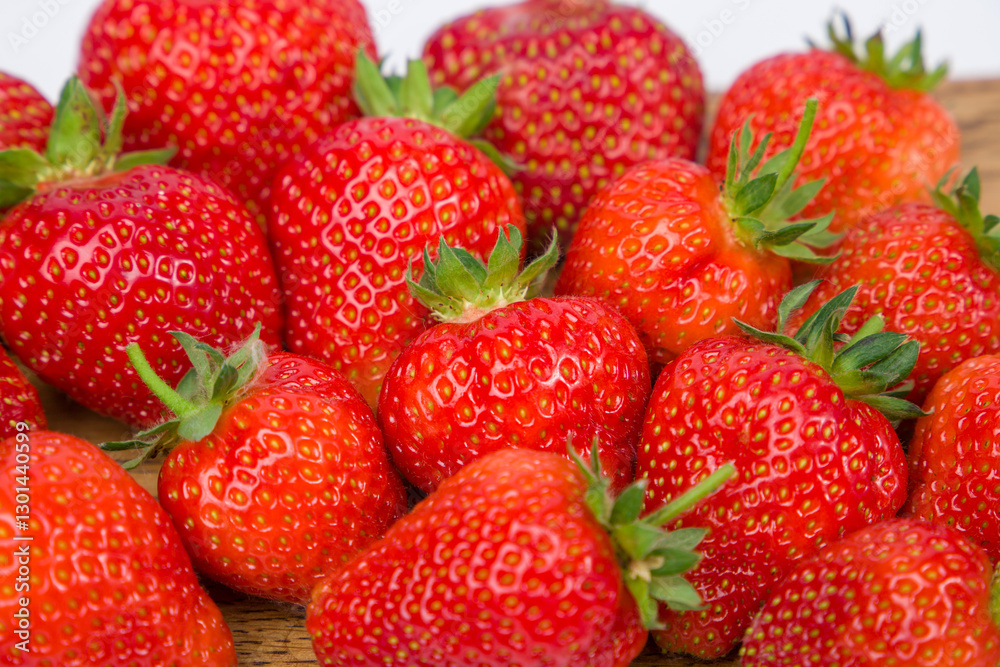ripe strawberries on white background, close up ripe strawberries on white background, close up