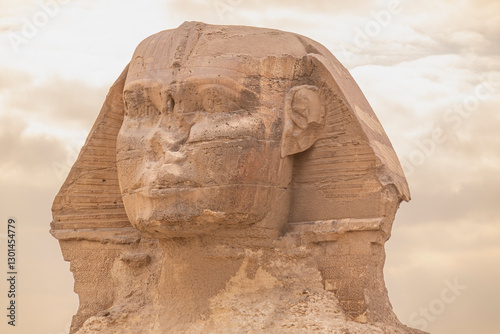 The Great Sphinx of Giza is a sphinx statue located in the Giza pyramids area in Cairo, the capital of Egypt.