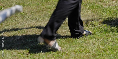 men lawn mower cutting the lawn