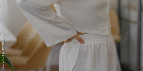 Beautiful girl stands and waves her hands
beautiful legs girl stands beautifully