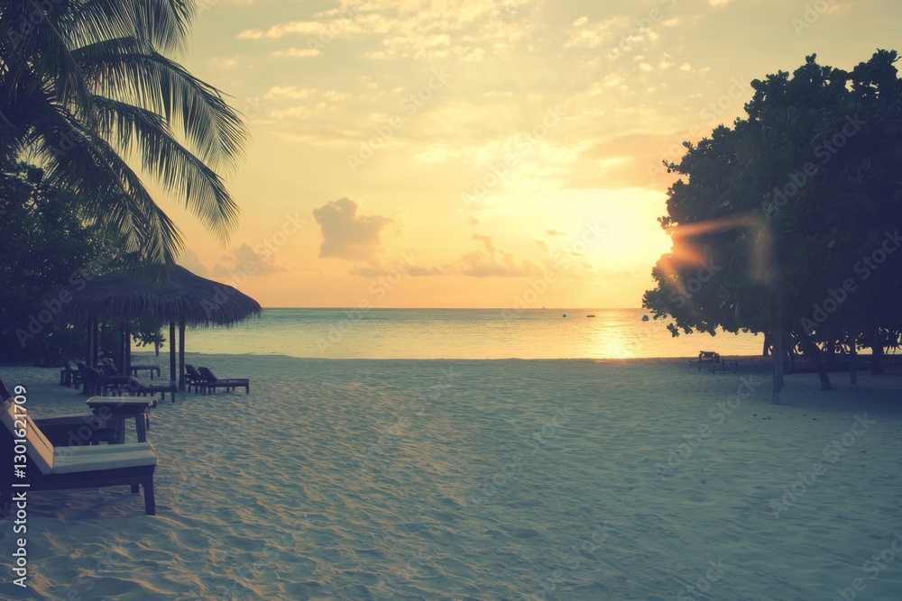 A serene tropical beach with palm trees and crystal-clear water, bathed in the soft glow of sunlight A serene tropical beach with palm trees and crystal-clear water, bathed in the soft glow of sunlight