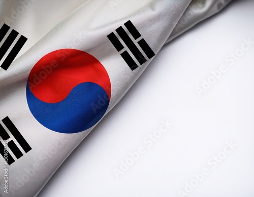 South Korean flag elegantly draped on a neutral background showcasing national pride and identity