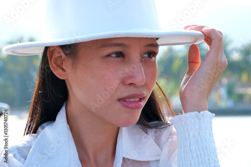 vietnamese girl in white hat classic beauty asian on lake in white clothes governess chic young lady Beach Woman in Sun Hat on Vacation