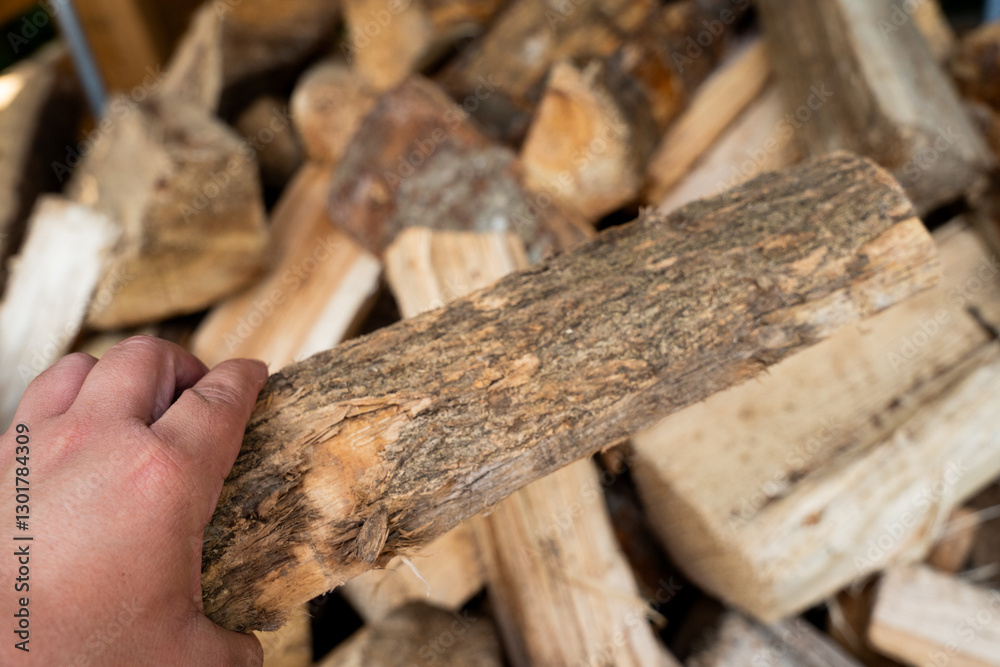 tacked wooden logs waiting to be lit, symbolizing warmth, adventure, and quality time with family and friends around the fire. tacked wooden logs waiting to be lit, symbolizing warmth, adventure, and quality time with family and friends around the fire.