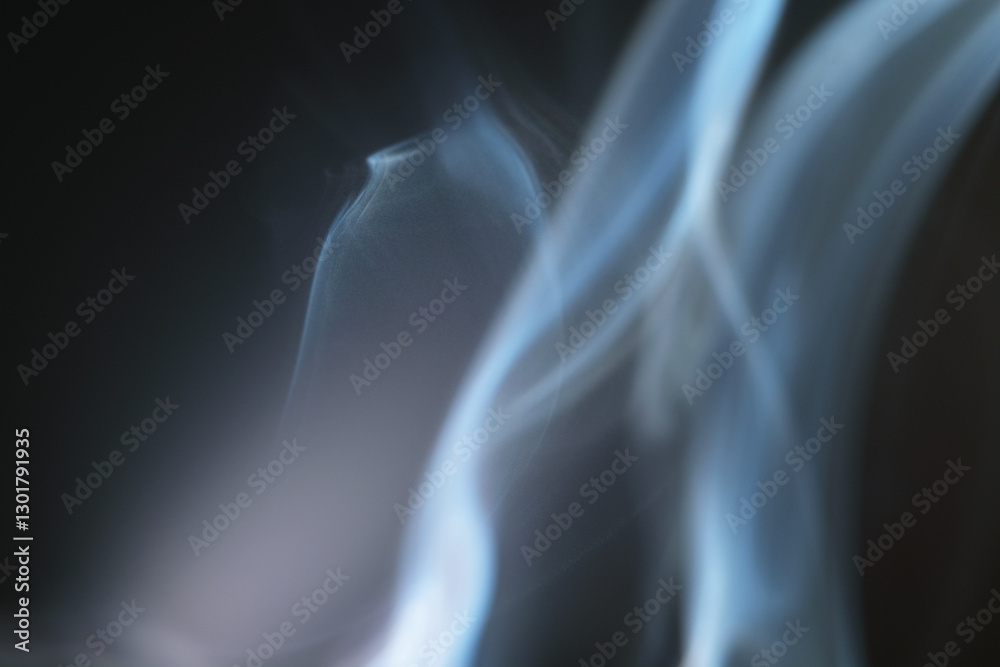 Macro shot of smoke swirl in the air as background Macro shot of smoke swirl in the air as background