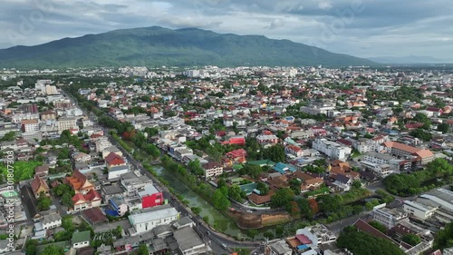 Chiang Mai, Thailand - Aerial drone video of Chiang Mai’s old city above one of the corners of the old moat and wall surrounding the historic city