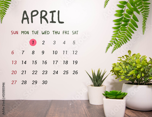 1 April on wooden grey cubes. Calendar cube date 01 April.