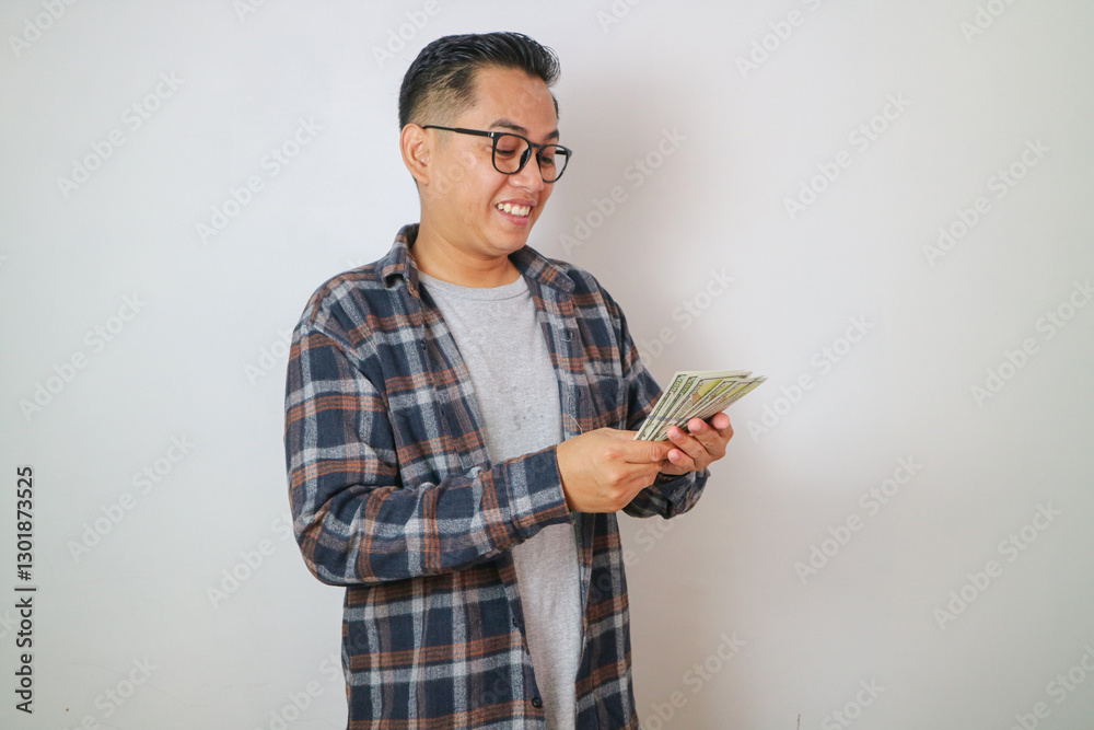 Happy asian man counting Money. Banking, Financial isolated, white background color concept. Happy asian man counting Money. Banking, Financial isolated, white background color concept.