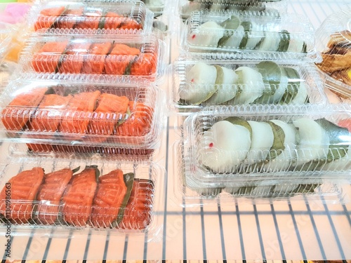 Close up of assorted chinese kueh ,cakes and sweet food sold at street stall in Singapore photo