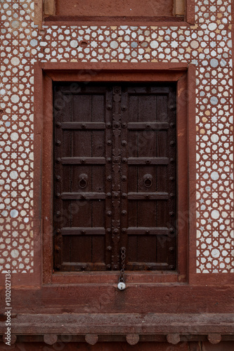 Agra , India - 2 January 2025 Old indian traditional wooden lock closed door at Agra  Uttar Pradesh  India Asia, South Asia