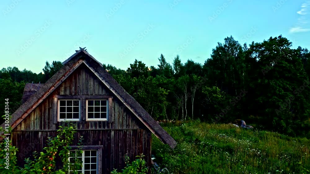 Small House in the Estonian Forests, Drone Flying By - Dolly Shot Small House in the Estonian Forests, Drone Flying By - Dolly Shot
