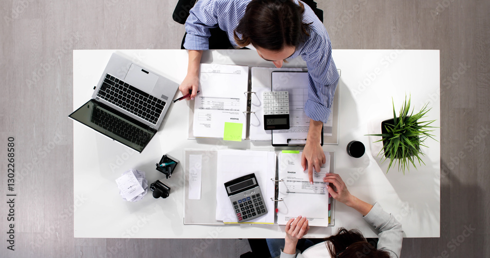 Busy accountants working on tax audits and compliance in the office