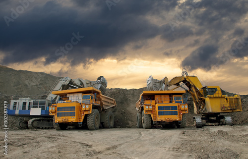 Industrial excavators loading ore into big yellow trucks of quarry. Open pit mining industry. No AI tools