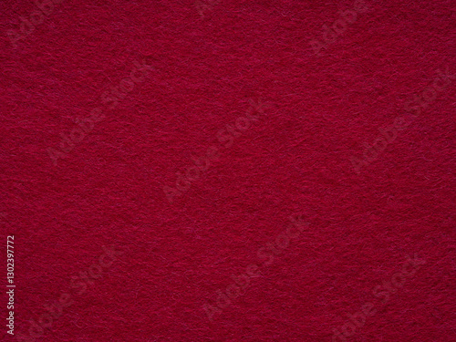 Obraz na płótnie A luxurious expanse of deep red felt, evoking warmth and sophistication in its sumptuous texture w salonie